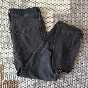 9” mid rise skinny jeans with cut off hem and distressed knees